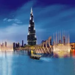 Take a boat ride "abra" directly under Burj Khalifa
