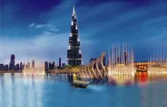 Take a boat ride "abra" directly under Burj Khalifa