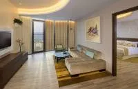 Deluxe Suite One Bedroom with Balcony, Partial Palm Sea View and Club Lounge Access